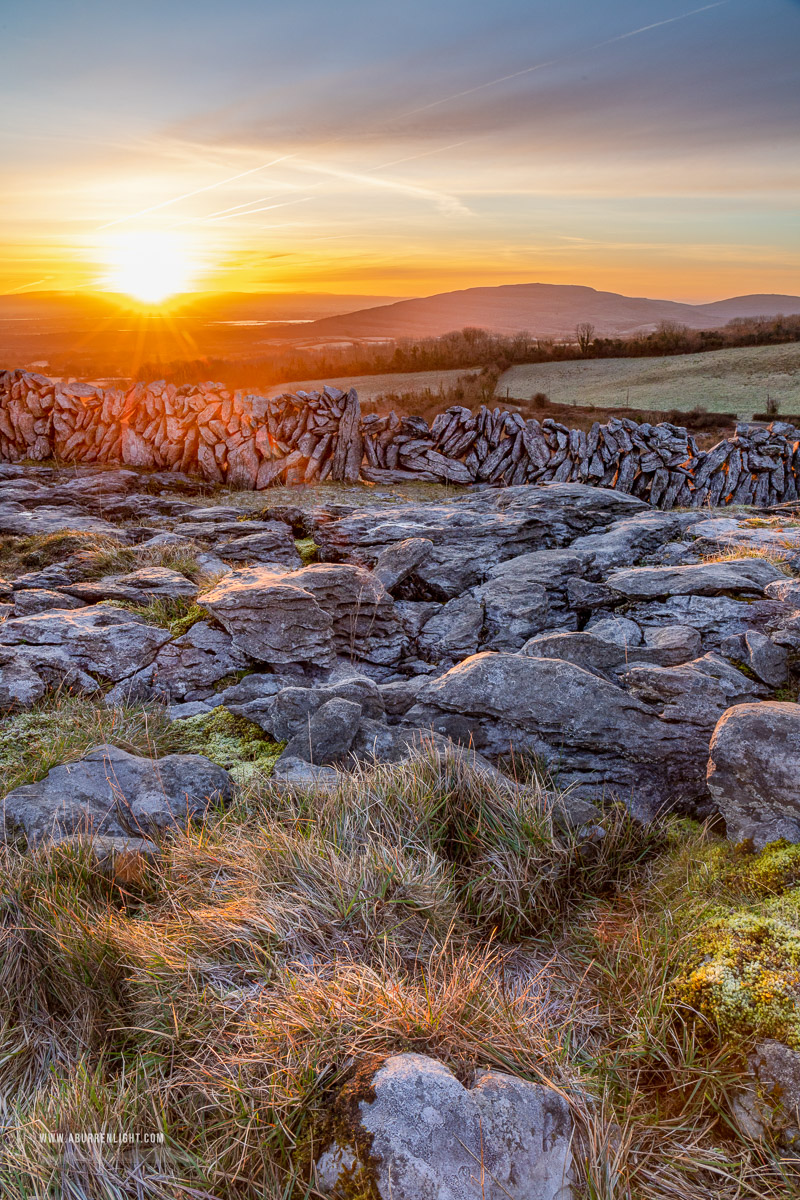 Fahee North Carron Burren East Clare Ireland - fahee,february,frost,golden hour,purple,sunrise,sunstar,wall,winter,hills